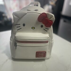 Hello Kitty Loungefly Mini Backpack Big Face White Red Bow NWT